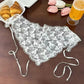 White lace floral lingerie with adjustable straps, styled with croissants and tulips for a chic fashion look