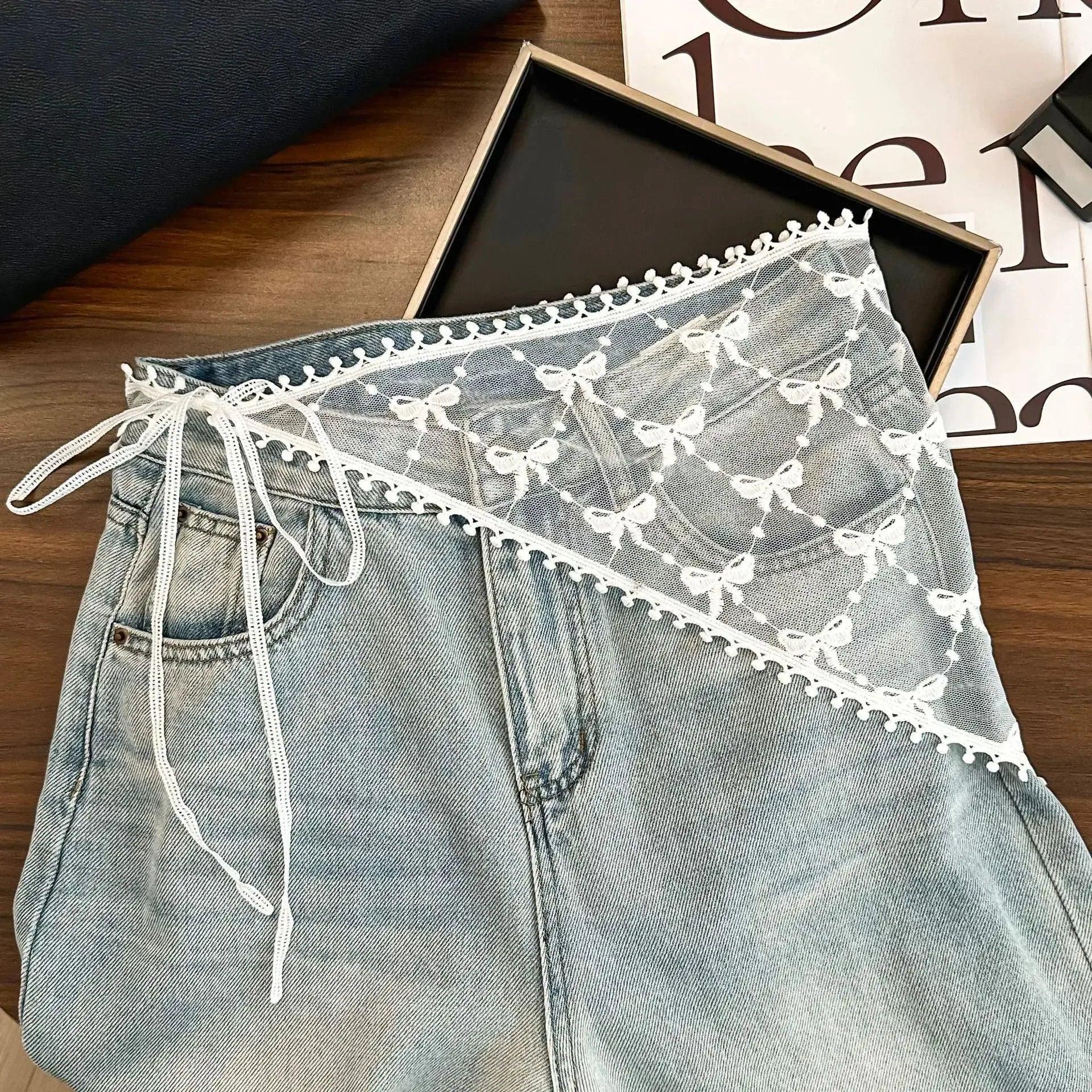 Women's denim shorts with white lace bow trim and drawstring waist, fashion style