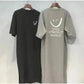 Black and gray women's T-shirts with smile graphic and 'Smile is the best makeup' text