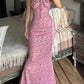 Pink floral maxi dress with spaghetti straps, perfect for women's fashion and elegant occasions.