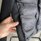 Black puffer jacket sleeve detail, women's fashion outerwear