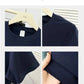 Navy blue women's basic t-shirt with round neck, soft fabric, and clean stitching details