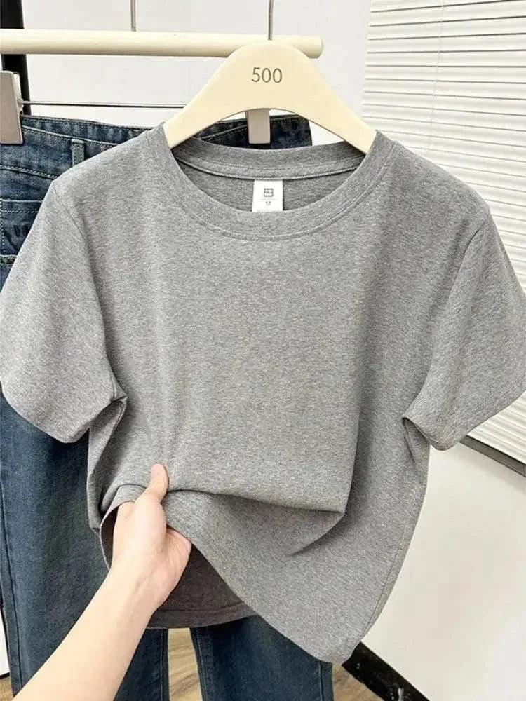 Gray women's oversized t-shirt on hanger, casual fashion top with relaxed fit