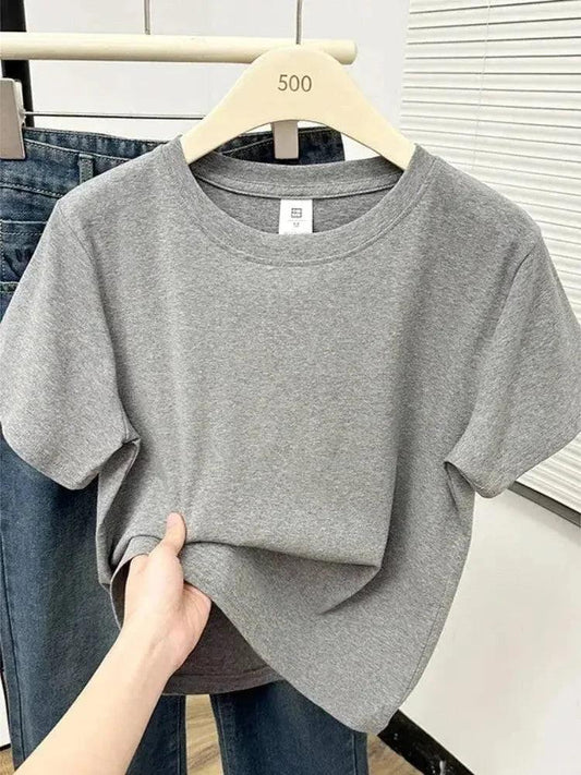Gray women's oversized t-shirt on hanger, casual fashion top with relaxed fit