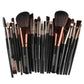 Professional makeup brush set with black handles and rose gold accents for beauty and fashion