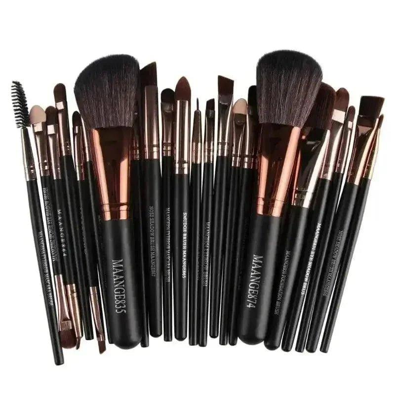Professional makeup brush set with black handles and rose gold accents for beauty and fashion