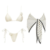 Cream bikini set with floral knot details and polka dot sarong, women's beachwear fashion