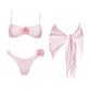 Pink polka dot bikini set with floral accents and matching bow cover-up for women's fashion