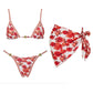 Floral print bikini set with matching sarong, red roses on white, gold accents, women's swimwear