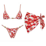 Floral print bikini set with matching sarong, red roses on white, gold accents, women's swimwear