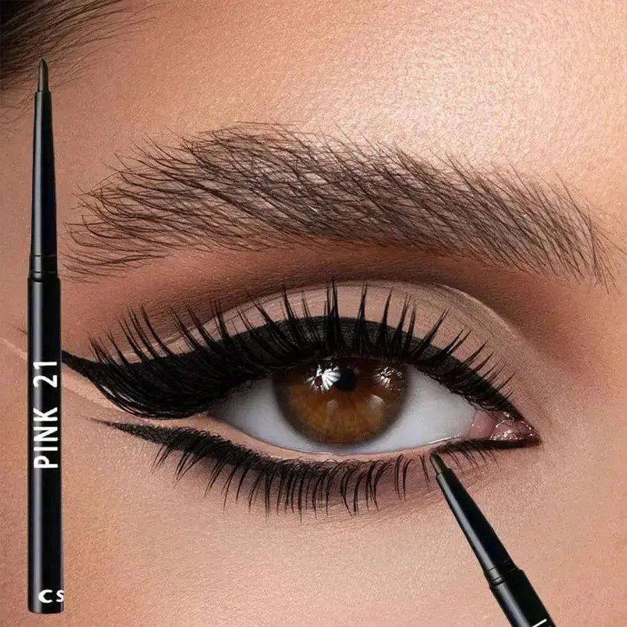 Pink 21 eyeliner pencil applying precise winged liner on brown eye, bold makeup look