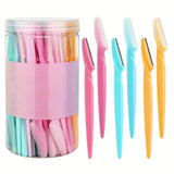 Pastel-colored eyebrow razors in clear jar, beauty grooming tools for women's fashion