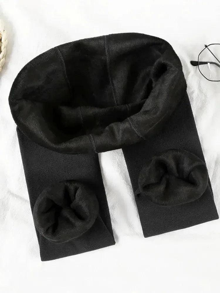 Black women's thermal leggings with fleece lining, cozy winter fashion wear