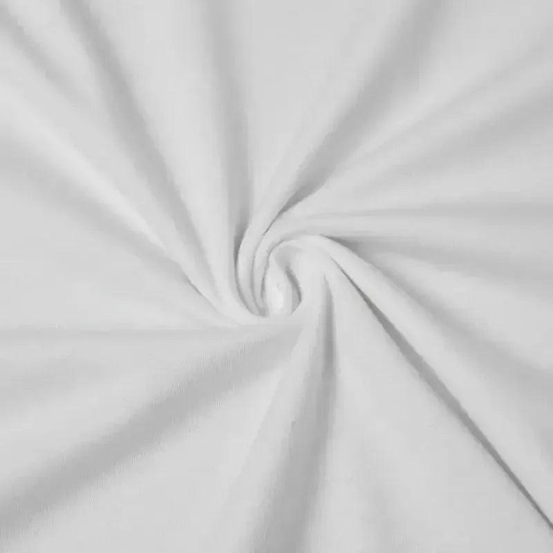 Soft white fabric swirled in elegant spiral, ideal for women's fashion apparel and dressmaking