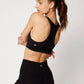 Woman in black sports bra and leggings, fitness activewear for workout and gym