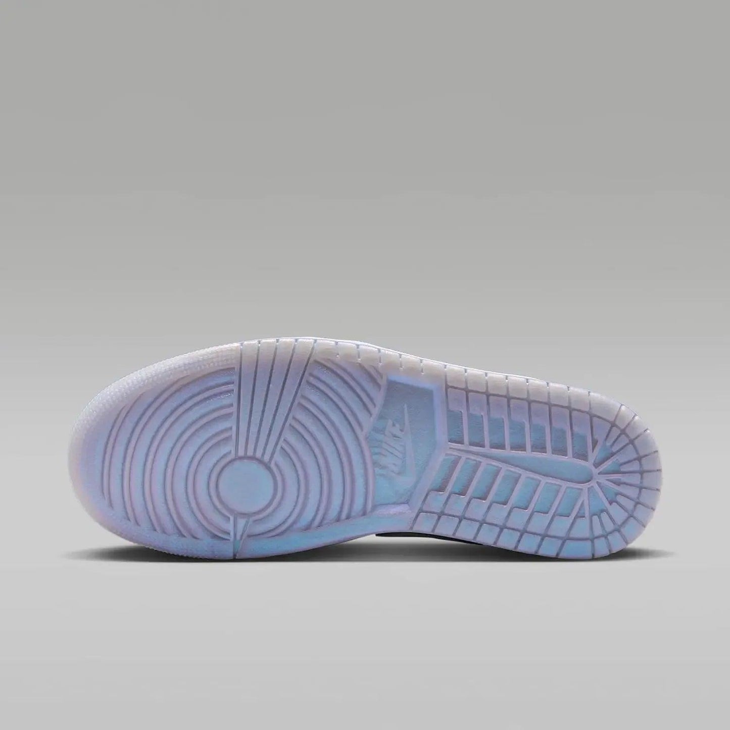 Iridescent blue and white sneaker sole with Nike Air design, stylish women's fashion footwear