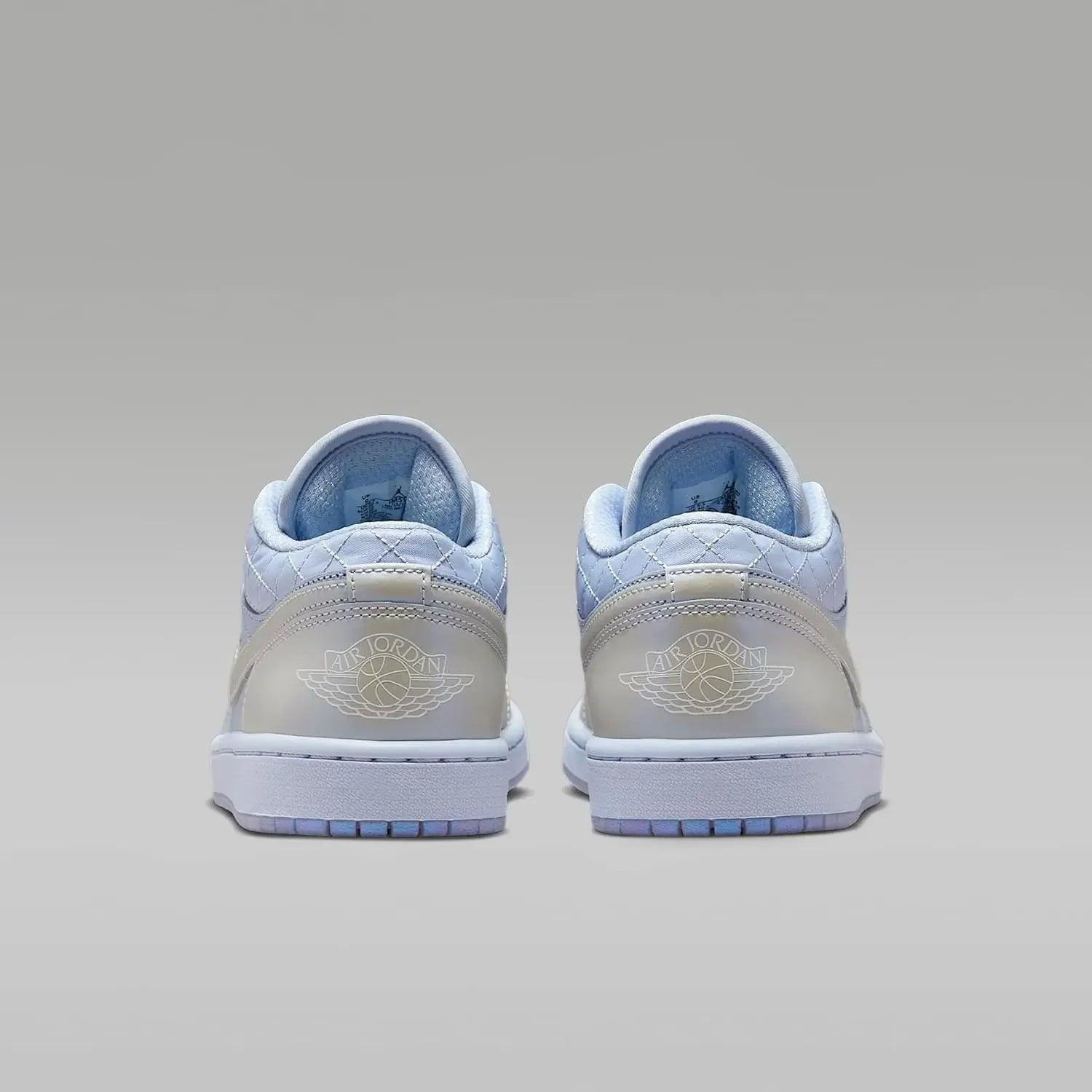 Light blue Air Jordan sneakers with quilted design and wing logo, women's fashion footwear