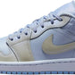 Women's light blue and beige low-top sneaker with quilted heel and Nike swoosh