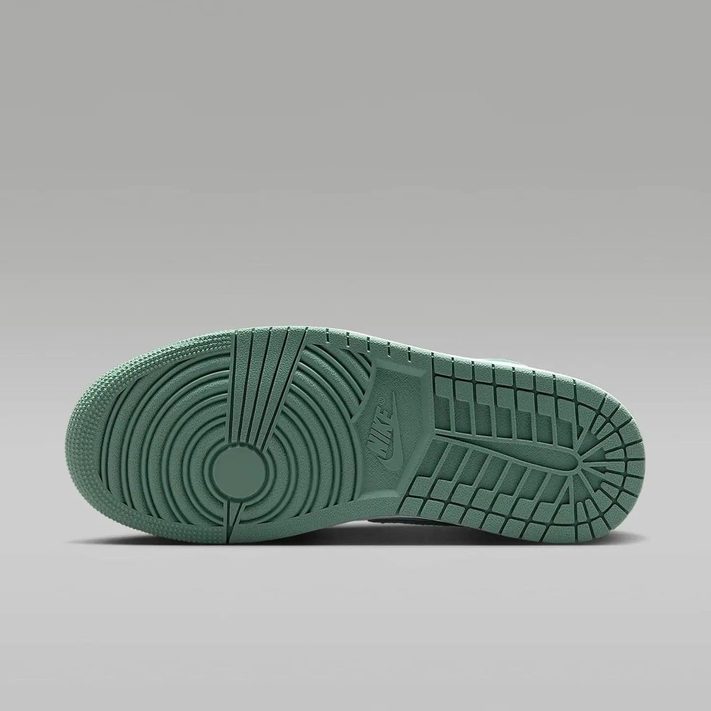 Nike sneaker sole in mint green with iconic tread pattern and logo, women's fashion footwear