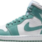 Mint green and white Air Jordan 1 high-top sneaker with Nike swoosh, perfect for women's fashion