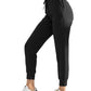 Black women's jogger pants with drawstring waist, paired with white sneakers for casual fashion