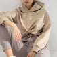 Woman in beige oversized hoodie and matching joggers, casual fashion outfit
