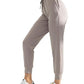 Women's gray jogger pants with drawstring waist, paired with white sneakers, ideal for casual or workout wear.