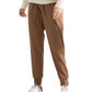 Brown jogger pants with drawstring waist, paired with white sneakers and cozy sweater for casual women's fashion