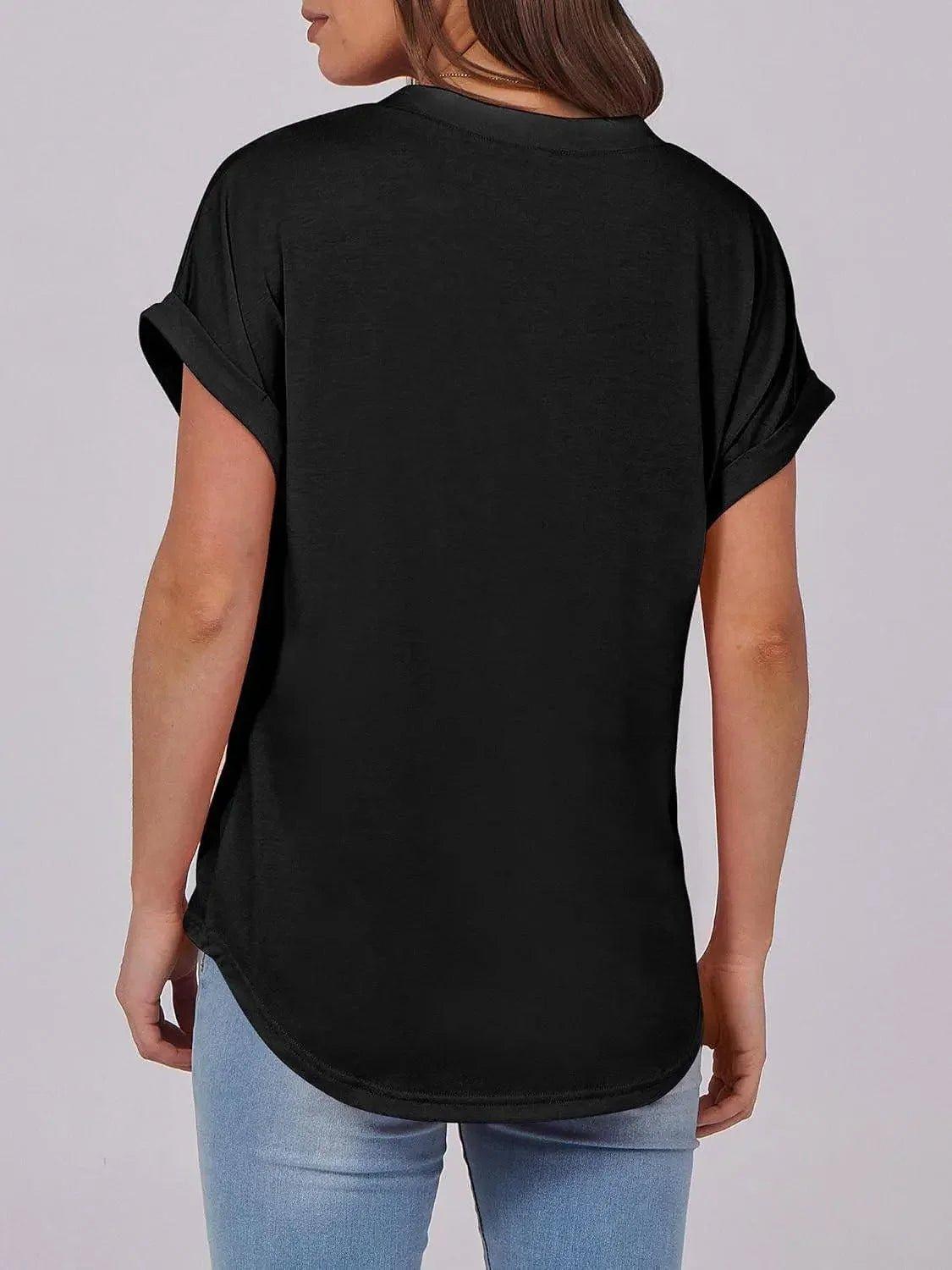 Black women's oversized t-shirt with rolled sleeves and curved hem, back view
