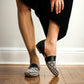 Women's black loafers with geometric beaded pattern, stylish slip-on shoes for fashion outfits