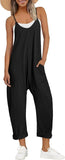 Woman wearing black sleeveless jumpsuit with pockets, white sneakers, and straw hat for summer fashion