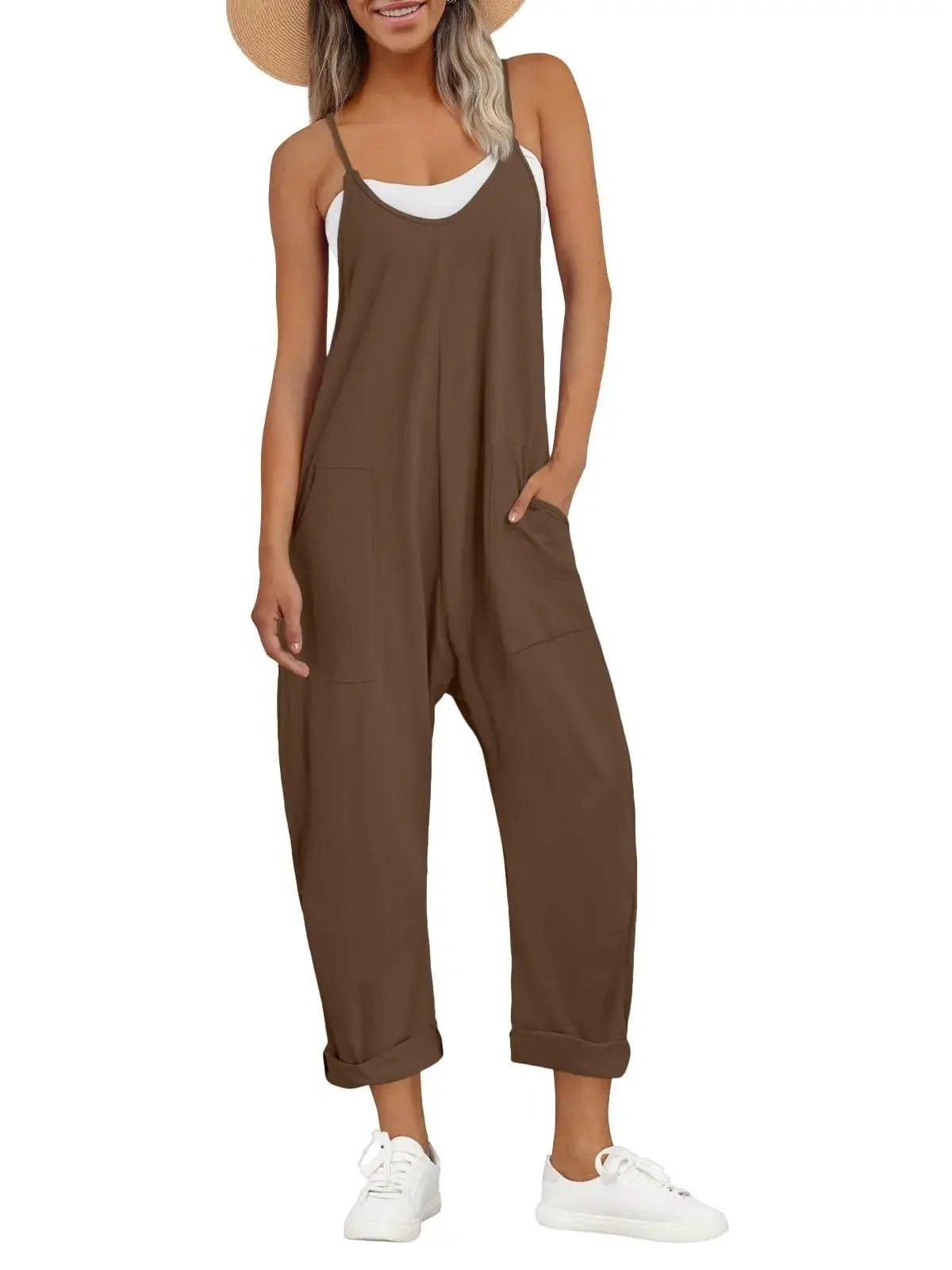 Brown women's jumpsuit with pockets, white sneakers, and straw hat for casual fashion