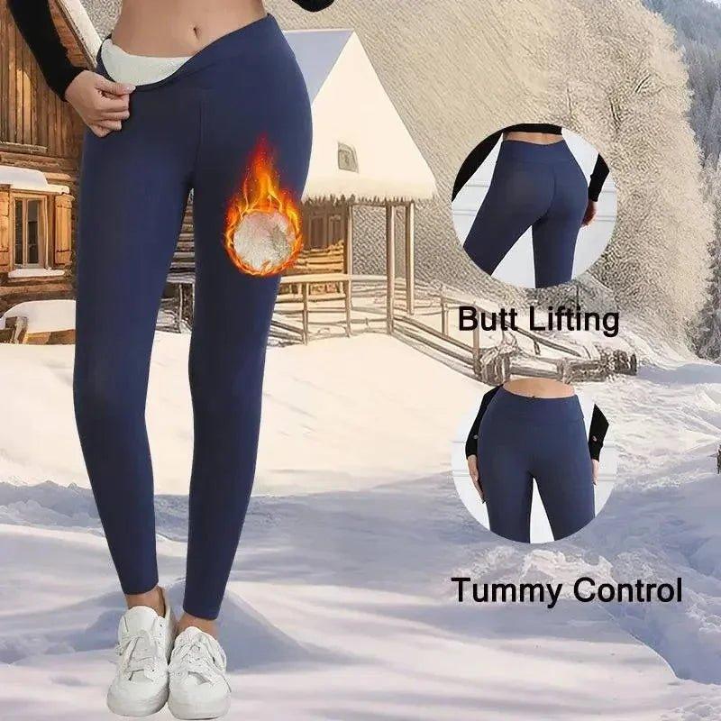 Women's navy blue thermal leggings with butt lifting and tummy control, ideal for snowy outdoor fashion.