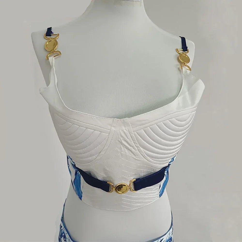 White quilted bustier top with gold hardware and navy blue straps, women's fashion