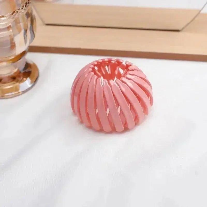 Pink spiral hair scrunchie for women's fashion styling