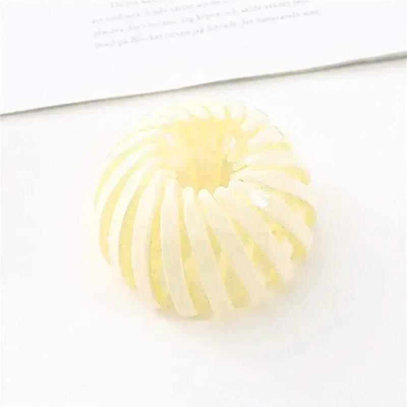 Cream spiral hair tie for women's fashion styling