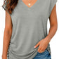 Gray V-neck women's t-shirt with ruched side, paired with distressed denim shorts for casual fashion