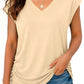 Beige V-neck women's fashion top with ruched side, paired with distressed denim shorts