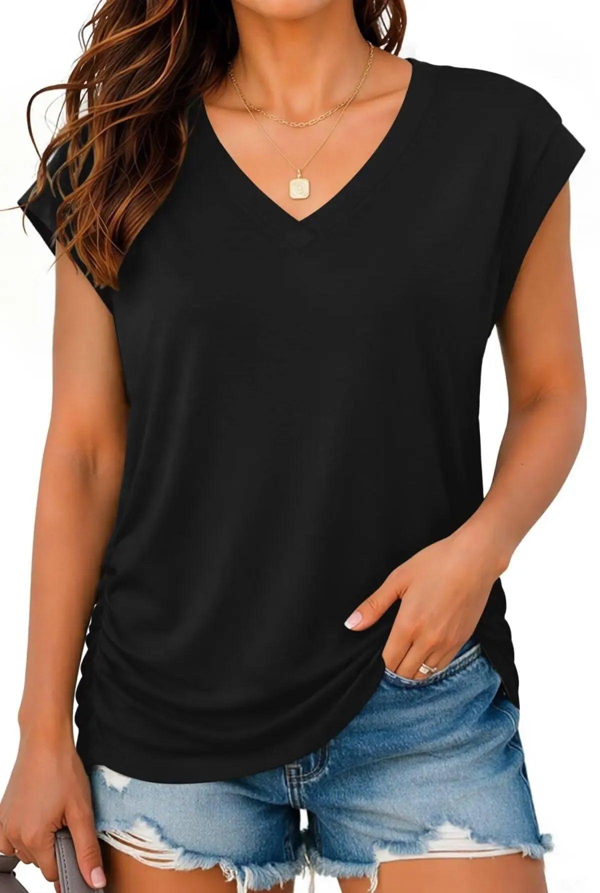 Black V-neck women's t-shirt with cap sleeves, paired with distressed denim shorts for casual fashion
