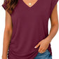 Burgundy V-neck women's t-shirt with ruched side, paired with denim shorts for casual fashion