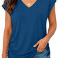 Woman wearing blue V-neck short sleeve top with denim shorts, casual summer fashion