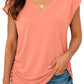 Coral V-neck women's fashion top with ruched side, paired with distressed denim shorts for casual summer style