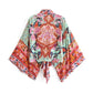 Boho floral kimono top with vibrant paisley print, tie-back detail, and flowing sleeves for women's fashion