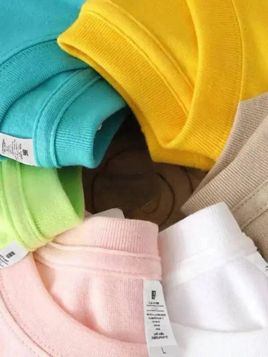 Colorful women's crewneck sweatshirts in pastel and bright shades, soft cotton blend fashion tops