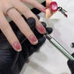 Nail art tool applying glitter gel polish for trendy manicure design