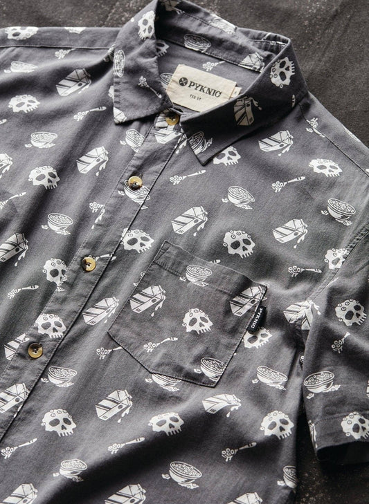Gray button-up shirt with skull and cereal bowl print, casual fashion top