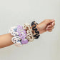 Crochet hair scrunchies in pastel and neutral colors, stylish women's fashion accessories