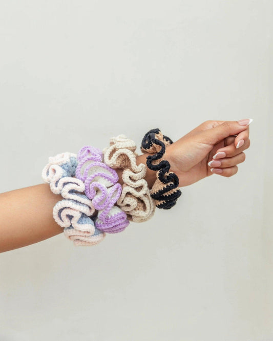 Crochet hair scrunchies in pastel and neutral colors, stylish women's fashion accessories