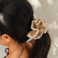 Crochet flower hair scrunchie in beige and cream, stylish women's fashion accessory for ponytail