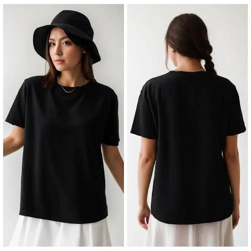 Black oversized t-shirt for women, front and back view with bucket hat and white skirt